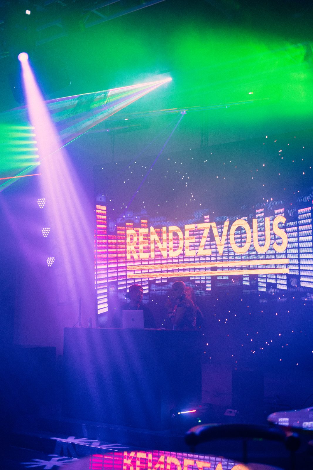 Green lasers over the LED stage on event night at Rendezvous nightclub Duluth